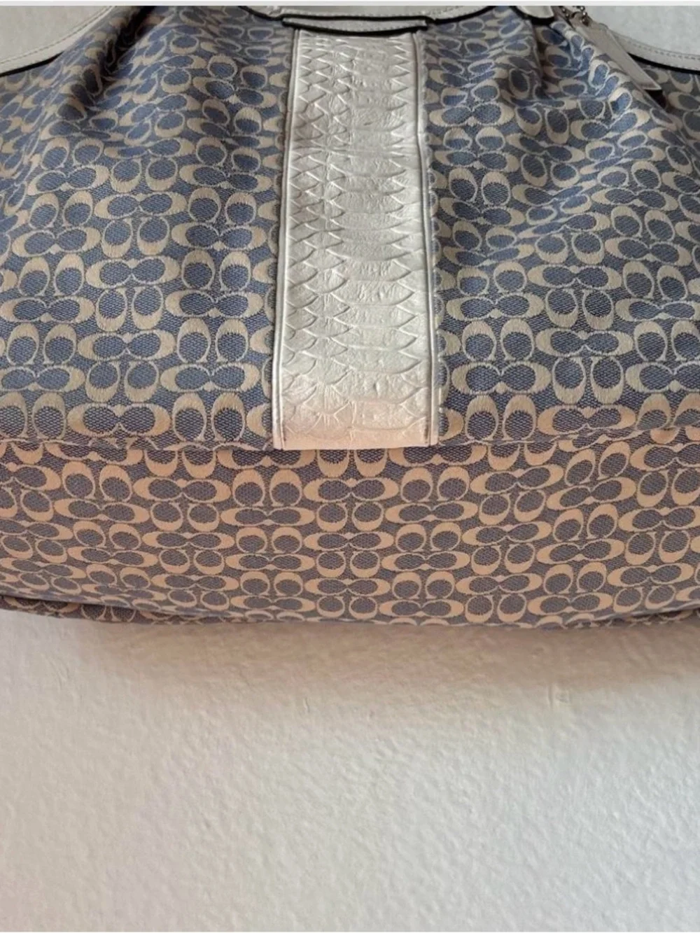 Sold Coach blue and cream